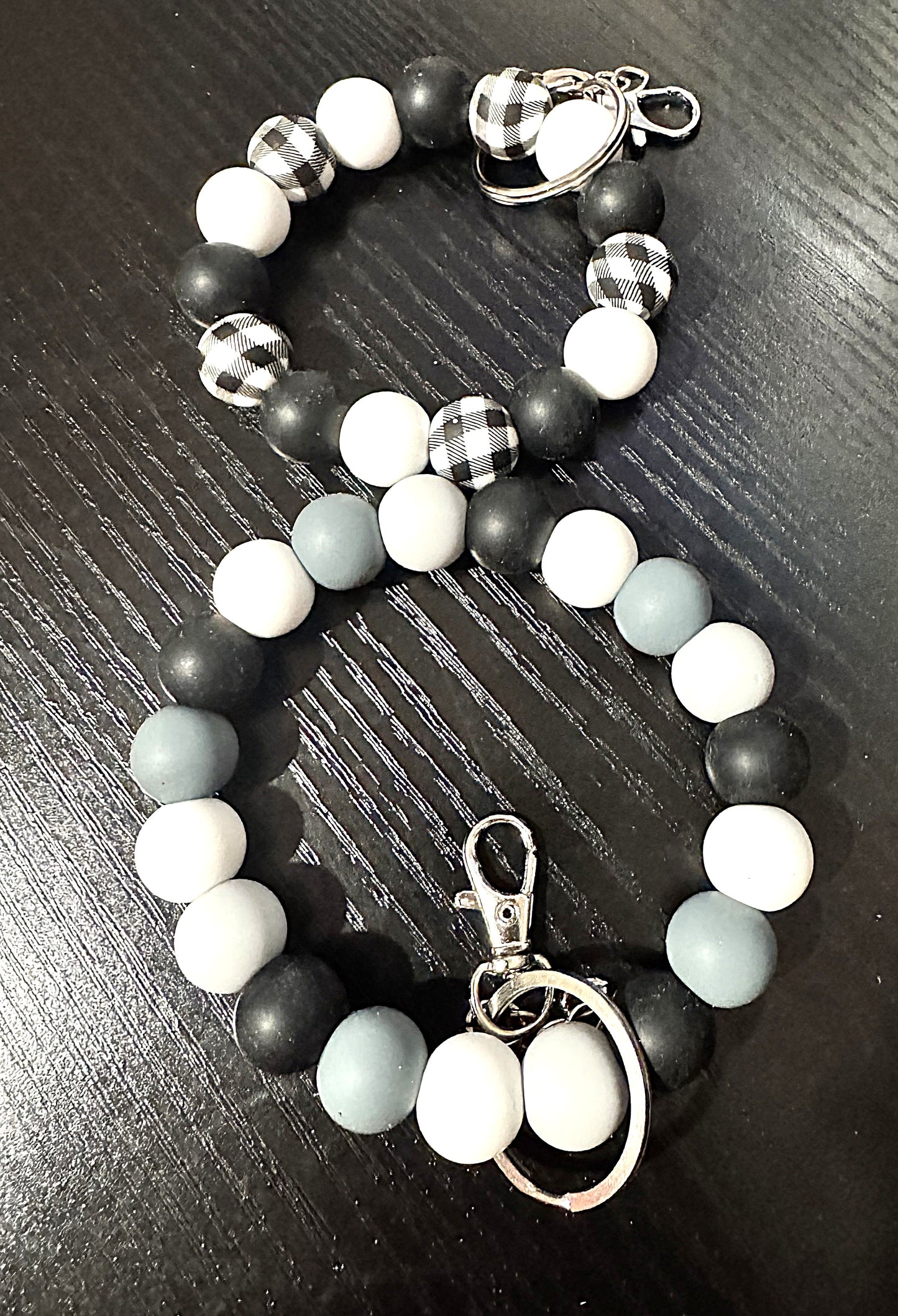 black and grey wristlet