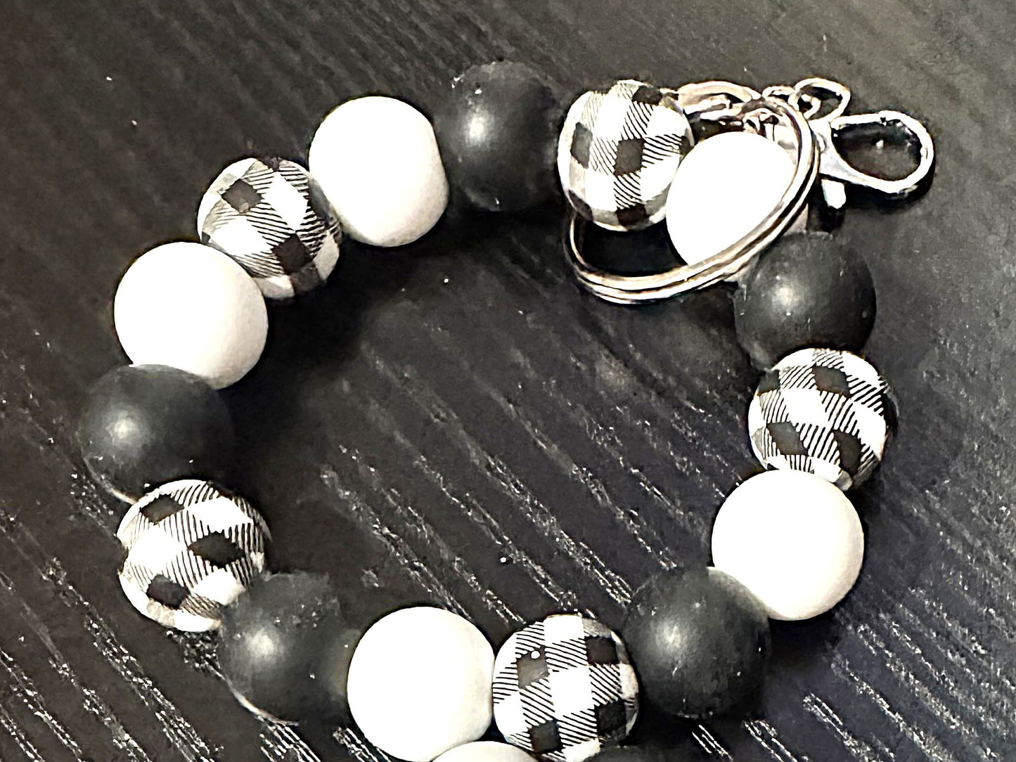 black and grey wristlet